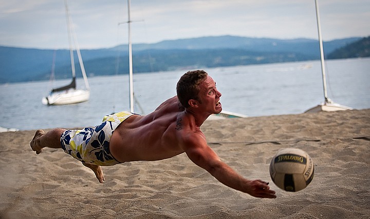 &lt;p&gt;BEN BREWER/Press William Berrier of Post Falls lays out into the sand for a one-handed dig during the 17th Annual Hot Foot two-on-two beach volleyball tournament at North Idaho College Beach on Saturday. Teams played throughout the sweltering heat all day for cash and prizes for the top finishers.&lt;/p&gt;