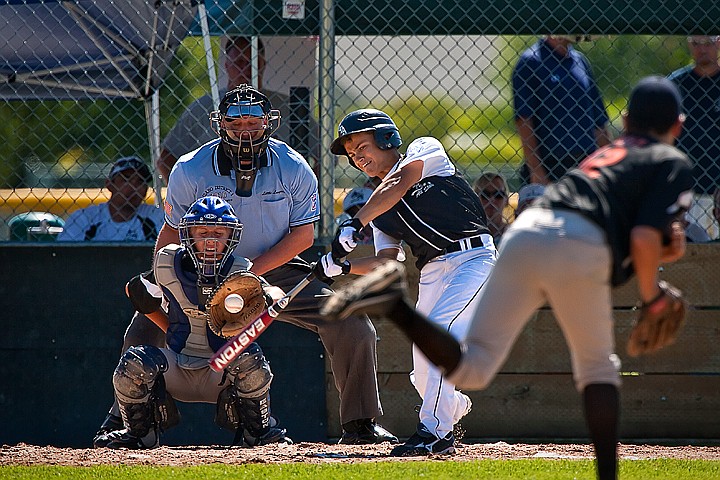 &lt;p&gt;BEN BREWER/Press Devin Kluss of the Coeur d'Alene All-Stars takes a hard cut at a pitch during the first inning of their 8-3 victory over Post Falls in the Masters Little League Championship game on Sunday.&lt;/p&gt;