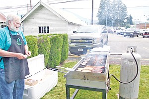 &lt;p&gt;John Johanson, Libby branch manager, grills burgers and hot dogs for Customer Appreciation Day where the new building announcement was made.&lt;/p&gt;