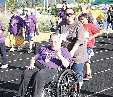 &lt;p&gt;Karen Williams of Arlee completes the survivor&#146;s lap with some help from her daughter, Rose Coates. Williams survived a bout of breast cancer 13 years ago, and is another perennial participant at the Lake County relay.&lt;/p&gt;