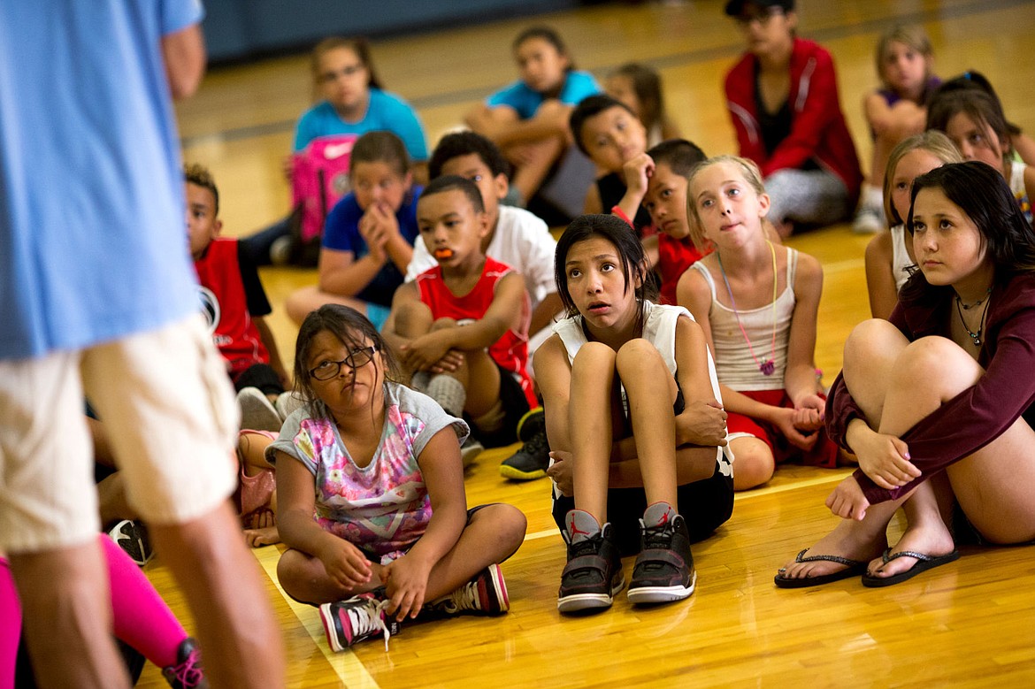 &lt;p&gt;JAKE PARRISH/Press Mariah Pluff, 13, center, listens intently with more than 140 other children to retired NBA player Craig Ehlo speak on Monday at the Benewah Medical and Wellness Center as part of the &quot;Rise Above&quot; program.&lt;/p&gt;