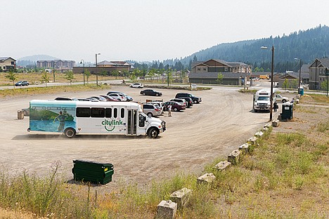 &lt;p&gt;A Citylink bus drives through a lot at Riverstone Friday before dropping of passengers at the hub. The site is one of two that the Coeur d&#146;Alene Tribe and Kootenai have purchased as a permanent location for the local transit service.&lt;/p&gt;