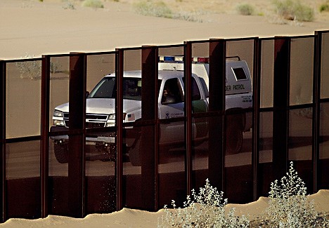 &lt;p&gt;FILE In this July 28, 2010 photo, a US border patrol vehicle drives along the U.S.-Mexico border fence near Yuma, Ariz., as seen from the outskirts of San Luis Rio Colorado, Mexico. Arizona launched a website Wednesday, July 20, 2011, to accept donations to pay for fencing along the Mexico border, and a supporter says the $3.8 million people donated to defend the state's 2010 immigration enforcement law could be just a taste of what to expect. (AP Photo/Guillermo Arias)&lt;/p&gt;