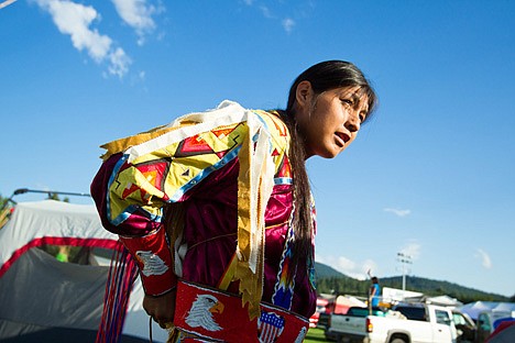 &lt;p&gt;Matthew Clements, 19, donnes his traditional garb, much of which has been passed down for generations, for the beginning ceremony of the 2012 Julyamsh Powwow in Post Falls.&lt;/p&gt;