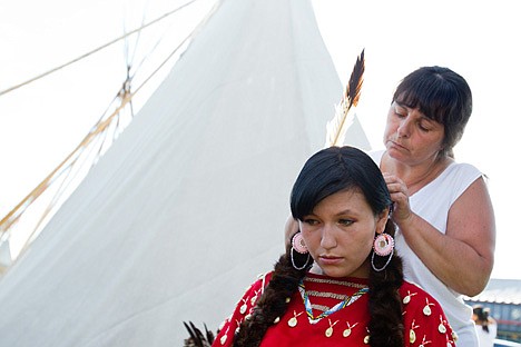 &lt;p&gt;Keeli Kirk, 17, left, has an eagle feather put in her hair by her aunt Angela Leigh, right, prior to the Julyamsh 2012 beginning ceremony Friday evening.&lt;/p&gt;