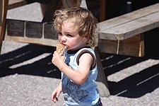 21-month-old Oliver Reynolds, of Polson, finishes off an ice cream cone during the Cherry Festival last weekend in Polson.