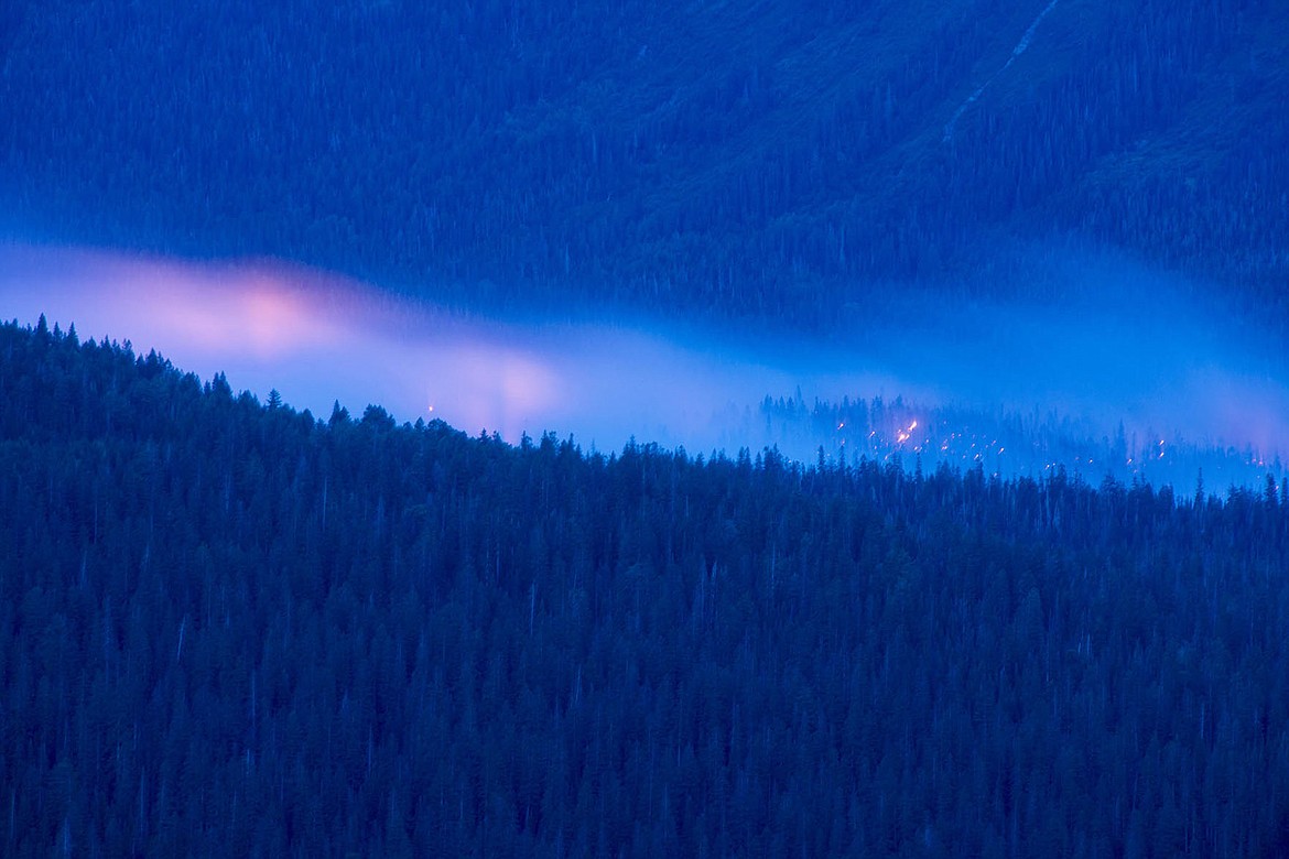 &lt;p&gt;The Reynolds Creek Wildland Fire burns near the Reynolds Creek campground in Glacier National Park Tuesday evening. By Wednesday at 9 a.m. the fire was reported to have covered 2,000 acres. (Chris Peterson/Hungry Horse News)&lt;/p&gt;