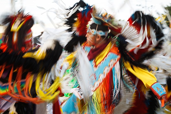 &lt;p&gt;A Native American dances among hundreds during the grand
entrance at Julyamsh.&lt;/p&gt;