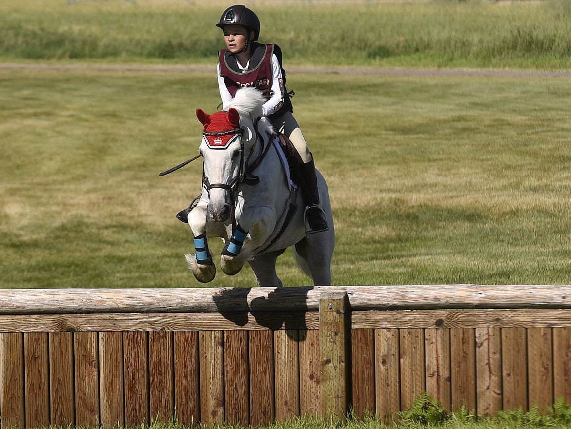 &lt;p&gt;Taylor McFall on Kilbarry Prince clears an obstacle during the Novice B cross country at The Event at Rebecca Farm on Friday. (Aaric Bryan/Daily Inter Lake)&lt;/p&gt;