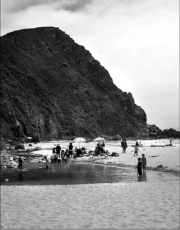 <p>This August 2010 photo shows beachgoers enjoying the day at Pfeiffer Beach in the heart of Big Sur, Calif.</p>
