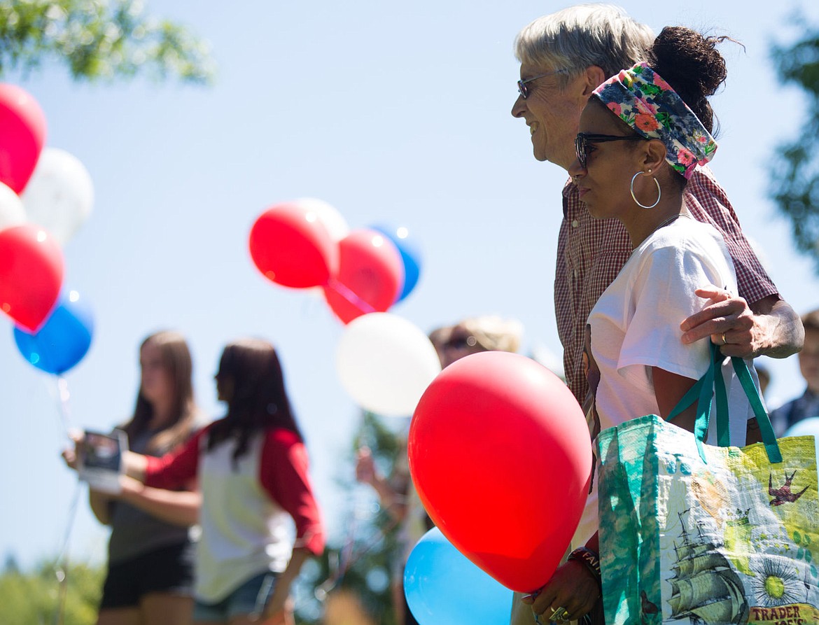 &lt;p&gt;Pastor David Warnick, of New Life Church, and Brandi Jones, Mother of Reggie Nault , get ready to release balloons for the 1 year anniversary memorial, Thursday, in Coeur d'Alene.&lt;/p&gt;