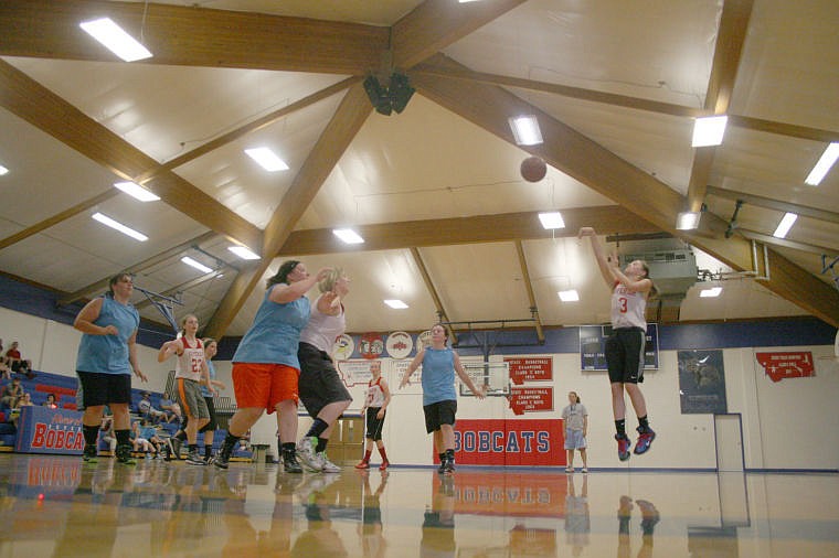 <p>Morgan Sharp of the Superior Lady Bobcats lets loose a three-pointer against Mullan last Tuesday.</p>