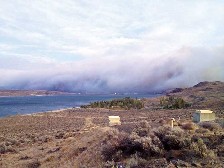 A brush fire on Yakima Training Center land as pictured from Vantage on Friday evening, July 18.
