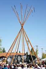 Tepee poles surround the new Eagle Circle Warrior/Veterans Wall of Remembrance outside the Confederated Salish and Kootenai Tribal Complex. A dedication ceremony took place last Wednesday where warriors and veteran members of the CS&amp;K Tribes were honored.