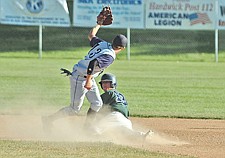 Kaileb Gillingham looks back after a steal attempt during the Mission Valley Mariners two-game sweep of the Bitterroot Bucs last Friday in Polson.