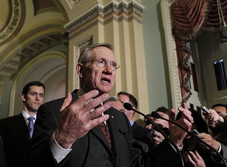 &lt;p&gt;Senate Majority Leader Harry Reid, D-Nev., speaks with reporters after the Senate cleared a hurdle to restore unemployment benefits to millions of Americans who have been out of work for more than six months, at the Capitol in Washington, Tuesday, July 20, 2010. The 60-40 vote came moments after Sen. Carte Goodwin, D-W.Va., left, a successor to West Virginia Democrat Robert Byrd, was sworn in.&lt;/p&gt;