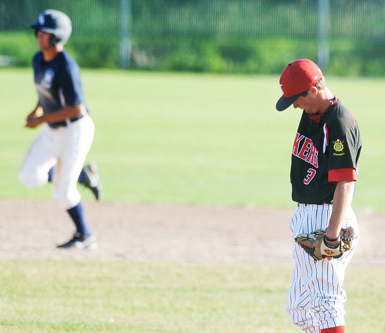 &lt;p&gt;Lakers pitcher Luke LaFontaine (3) hangs his head as Coeur d'Alene's Gibson Green (left) rounds the bases after a two-run homer to put the Lumbermen up 11-8 over the Lakers Friday evening during Kalispell's loss to Coeur d'Alene at Griffin Field. July 19, 2013 in Kalispell, Montana. (Patrick Cote/Daily Inter Lake)&lt;/p&gt;