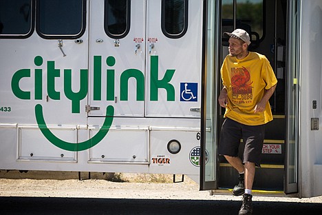 &lt;p&gt;Martin Burke, of Coeur d'Alene steps off a Citylink bus Monday as it drops off passengers at the transit center in Riverstone.&lt;/p&gt;