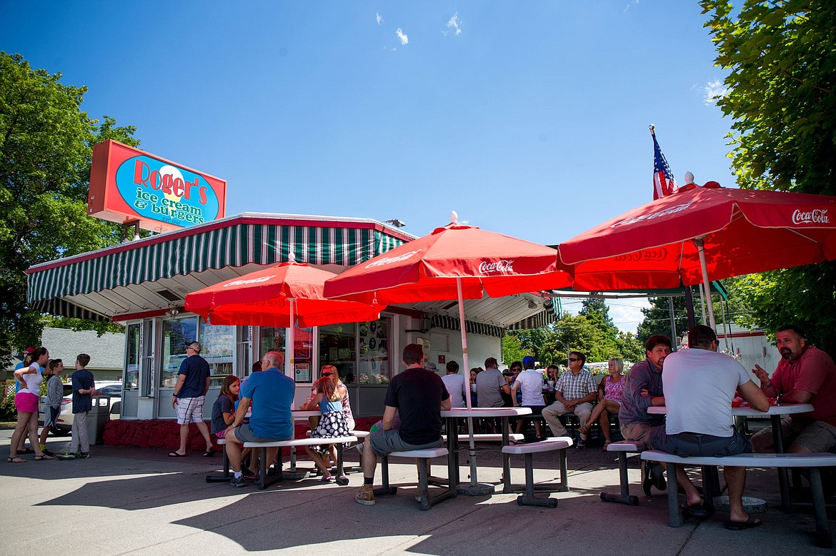 &lt;p&gt;JAKE PARRISH/Press People enjoy the clear, sunny skies of Wednesday afternoon as they eat at Roger's Ice Cream and Burger shop on Sherman Avenue in Coeur d'Alene. At a time where sales are normally at their highest, tourist hot-spots in Coeur d'Alene are noticing smaller numbers of customers due to the cloudy, colder summer thus far.&lt;/p&gt;