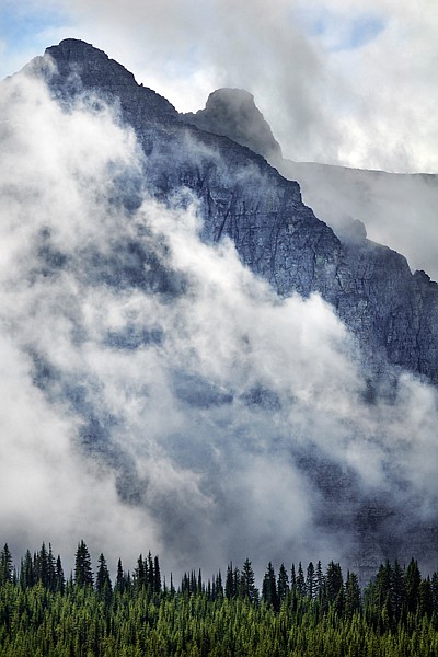 Clouds partially obscure Mount Cannon in this view from Going-to-the-Sun Road in Glacier National Park.