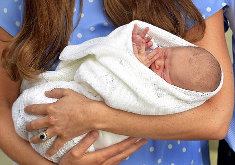 &lt;p&gt;Kate carries her new born son, the Prince of Cambridge, who was born on Monday. into public view for the first time outside the Lindo Wing of St. Mary's Hospital, in London, Tuesday.&lt;/p&gt;