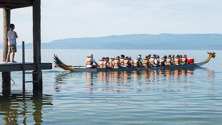 &lt;p&gt;Patrick Cote/Daily Inter Lake On a dock at Flathead Lake Lodge Ben Townley, 10, watches a a dragon boat paddle around the bay Thursday afternoon during a demonstration of dragon boat racing on Flathead Lake. Thursday, July 19, 2012 in Bigfork, Montana.&lt;/p&gt;