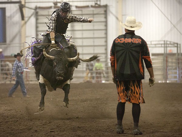 &lt;p&gt;Hunter Zigler of Kalispell holds on moments before falling and getting stepped on by a bull during the Rocky Mountain Bulls and Broncs Challenge at Majestic Valley Arena Saturday evening.&lt;/p&gt;