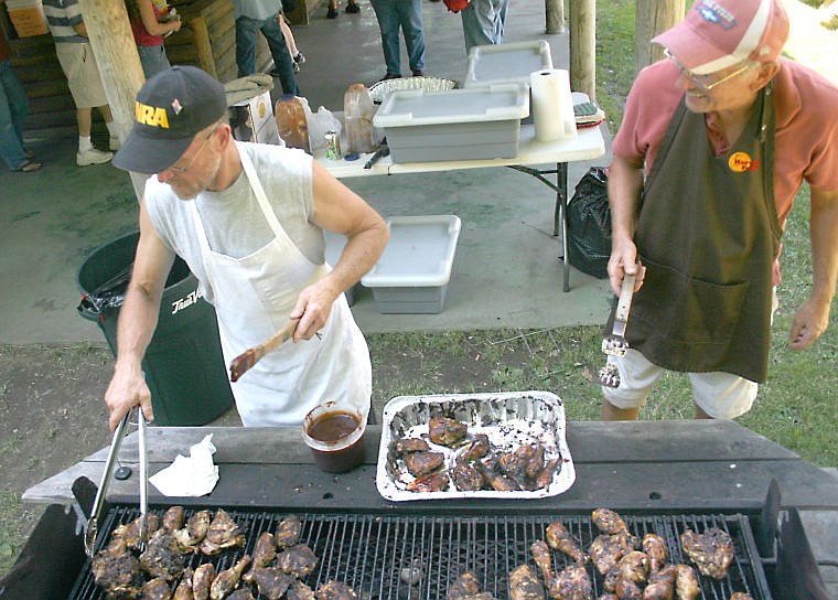 &lt;p&gt;Bob Butte and Wally Gibe man one of the grills at the annual Chicken Jamboree where 350 pounds of chicken were consumed. The annual event helps raise money for the Men's Prayer Breakfast Group in Thompson Falls.&lt;/p&gt;