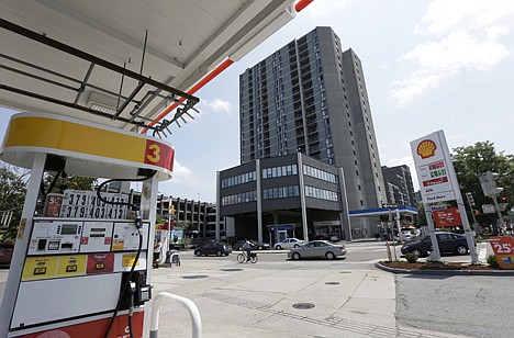 &lt;p&gt;A Shell gas station, foreground, where a carjack victim escaped from Boston Marathon bombing suspects Tamerlan and Dzhokhar Tsarnaev, after they allegedly shot and killed MIT police officer Sean Collier, sits across from an apartment building that was home to Stephen Silva, in Cambridge, Mass.&lt;/p&gt;