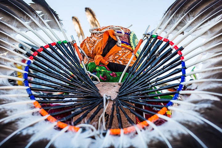 &lt;p&gt;JAKE PARRISH/Press A man participating in the dancing ceremony wears a traditional head dress during the Julyamsh Powwow on Friday at the Greyhound Park and Event Center in Post Falls.&lt;/p&gt;