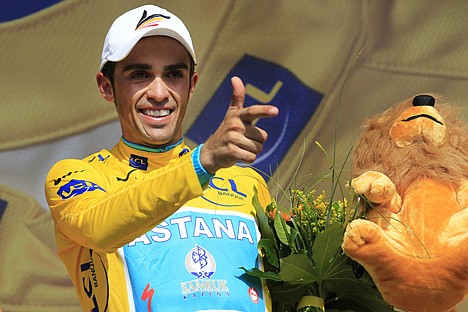 &lt;p&gt;Alberto Contador of Spain, wearing the overall leader's yellow jersey, mimics a pistol on the podium after the 19th stage of the Tour de France cycling race, an individual time trial over 52 kilometers (32.3 miles) with start in Bordeaux and finish in Pauillac, south western France, Saturday, July 24, 2010.&lt;/p&gt;