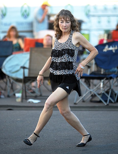 <p>Deb Hall, of Columbia Falls, dances on Saturday, July 21, at the Somers Cajun Street Dance.</p>
