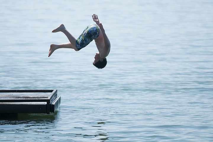 &lt;p&gt;Troy Flatt, 15, does a front flip off a dock at the Somers
swimming access on Flathead Lake Monday afternoon.&lt;/p&gt;