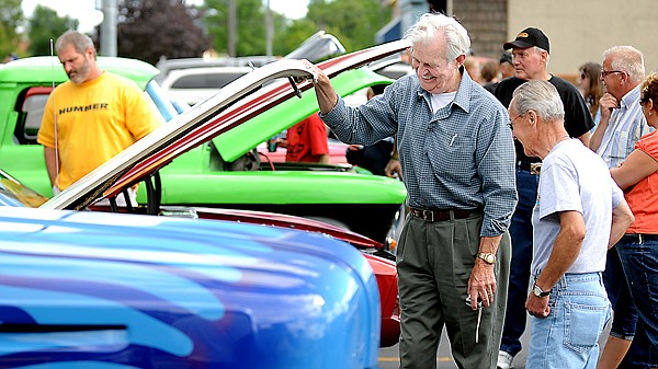 &lt;p&gt;From left, Tom Needham, of Bigfork, smiles as he shows off his
1965 to Shorty Amera of Lethbridge, Alberta, on Friday evening at
the Glacier Rally in the Rockies show and shine in Kalispell.&lt;/p&gt;