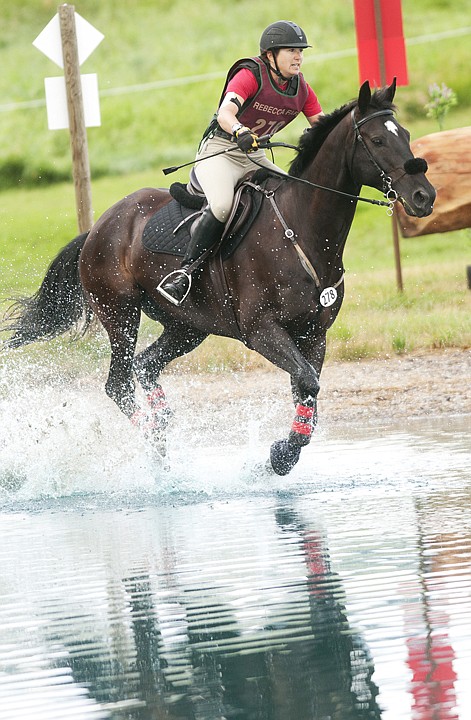 &lt;p&gt;Rachel Ambrose rides &quot;Brumby&quot; through one of two water features
on the cross country section of The Event at Rebecca Farm during
the second day of competition Friday morning.&lt;/p&gt;