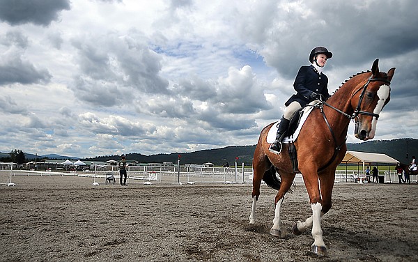 &lt;p&gt;Michelle Eld of McCall, Idaho, practices on Seamus IV on
Thursday morning at Rebecca Farm in Kalipsell. Eld was preparing
for her turn in the Senior Open Novice C Dressage competition.&lt;/p&gt;