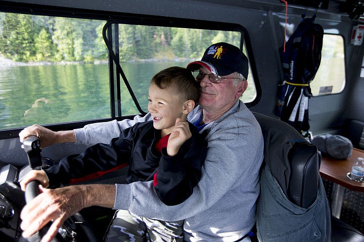 &lt;p&gt;Boats for Heroes co-founder and Vietnam veteran Keith Mathews lets Collin Rzepa, 5, take control of the 31-foot aluminum fishing boat the non-profit uses to take veterans on fishing trips in Washington and Idaho.&lt;/p&gt;