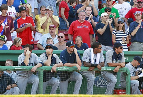 &lt;p&gt;Boston Red Sox fans stand and applaud behind the Seattle Mariners bench with two outs in the top of the ninth inning Sunday in Boston. The Red Sox won 12-8, extending the Mariners' franchise-worst losing streak to 15 games.&lt;/p&gt;