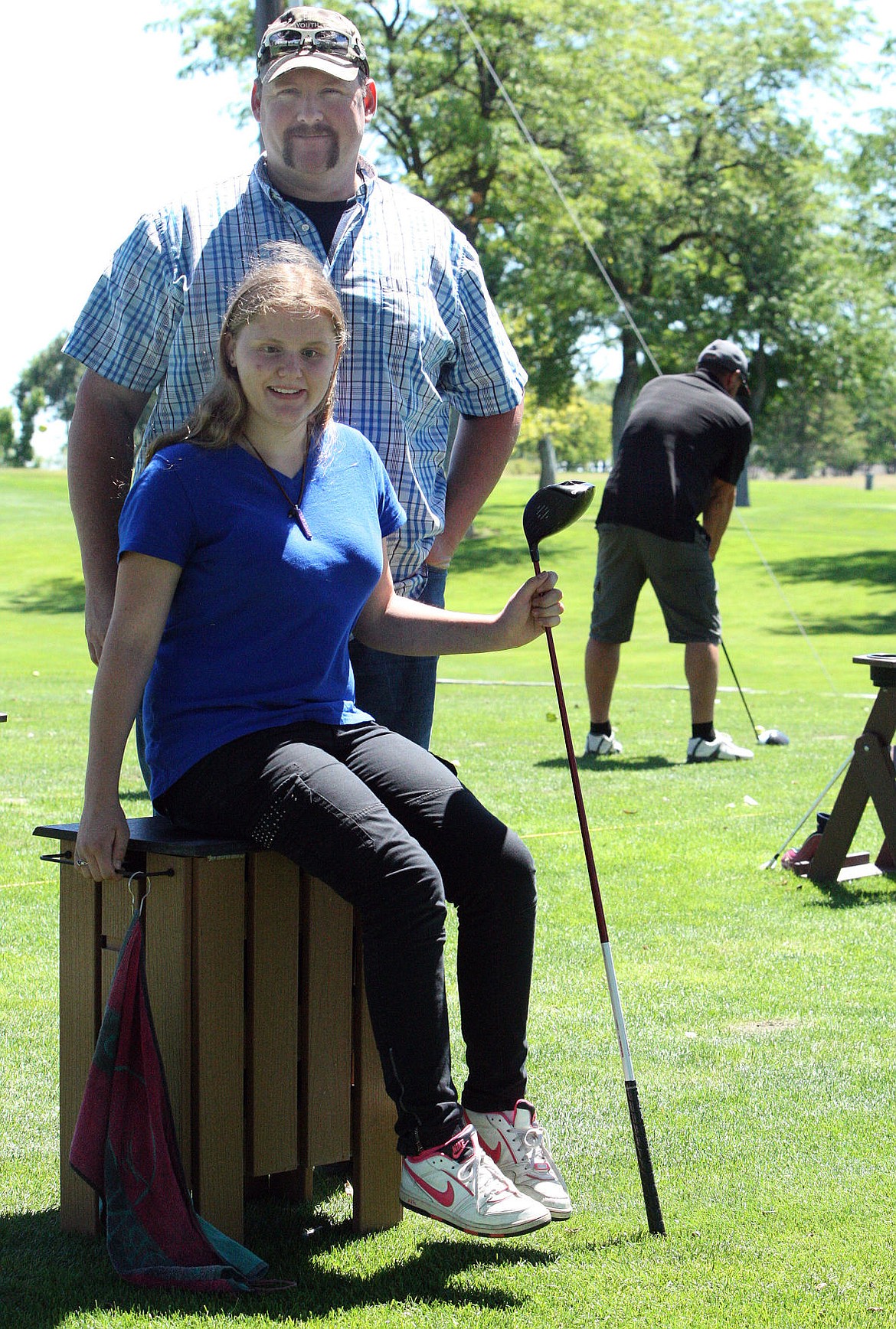 Maegan Weiler and her father Matt were on hand to help support the Yough Outdoor Unlimited golf tournament Saturday at the Moses Lake Golf Club. Maegan, who lost her sight seven years ago, was part of YOUs bear hunt earlier in the year.