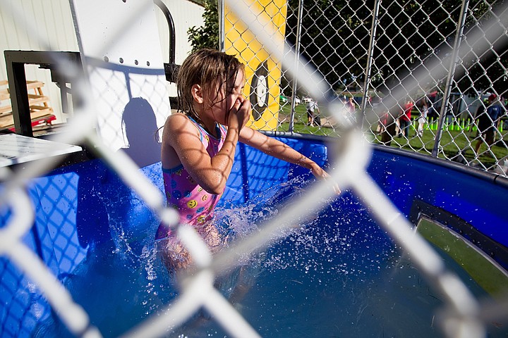 &lt;p&gt;9-year-old Sydney McLean plugs her nose as she drop into a dunk tank Friday at Hayden Days in the city park. The Hayden Days Parade kicks off today's festivities at 10:00 a.m. along Government Way from Hayden to Honeysuckle Avenue. Various activities will continue throughout the day, wrapping up at 10:00 p.m.&lt;/p&gt;