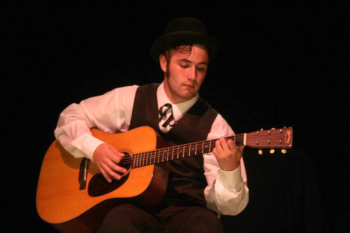 &lt;p&gt;Raiven Mathiason picks a guitar solo during the Vaudeville production.&lt;/p&gt;