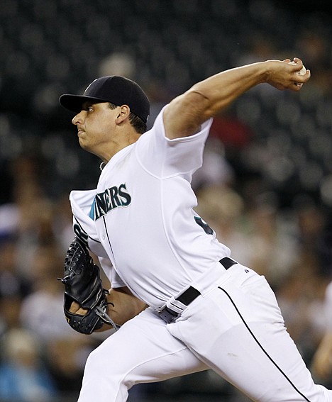 &lt;p&gt;Mariners starting pitcher Jason Vargas fires a pitch during the eighth inning Thursday night. Seattle beat the visiting Kansas City Royals 4-1.&lt;/p&gt;