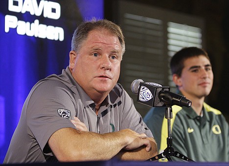 &lt;p&gt;REED SAXON/Associated Press Oregon coach Chip Kelly and tight end David Paulson face reporters at the Pac-12 football media day in Los Angeles on Tuesday.&lt;/p&gt;