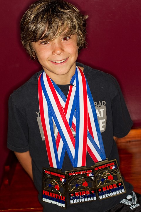 &lt;p&gt;Ridge Lovett, 9, won national titles in the USA Wrestling folkstyle, freestyle and Greco-Roman tournaments this year.&lt;/p&gt;