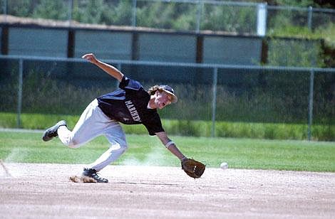 Ethan Smith/Leader<br>Mariner Tyler Trudeau makes the scoop and the put-out during the game against Deer Lodge last Thursday, and was all over the infield on defense during the district tournament in Kalispell last weekend. The Mariners beat Deer Lodge 14-1, and will start state tourney action today in Billings.