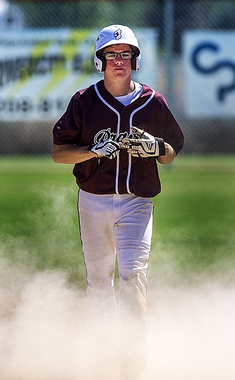&lt;p&gt;American Legion Prairie Cardinal&#146;s Michael Bodak walks off the field after being tagged out at second base, ending the eighth inning. The Prairie Cardinals lost 12-9 against the Lewiston Clarkston Titans in the first game of the District AA Area A tournament championship game.&lt;/p&gt;