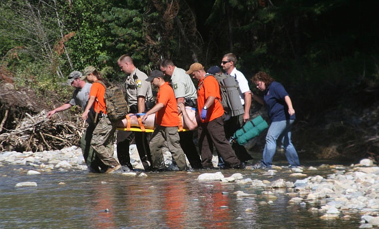 &lt;p&gt;Emergency responders transport a victim of the helicopter crash near Prospect Creek outside of Thompson Falls. The victim was loaded into a waiting ambulance and transported to the Thompson Falls Airport where they were met by Life Flight out of Missoula.&lt;/p&gt;