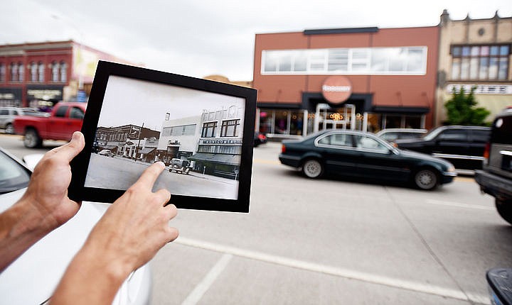 &lt;p&gt;Trek Stephens holds up a historic black and white photo that shows the way the current front of the Toggery in downtown Kalispell mimics the original building. (Brenda Ahearn/Daily Inter Lake)&lt;/p&gt;