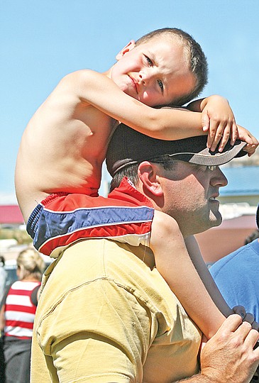 &lt;p&gt;Braedon Ferris has the best seat in the house atop his dad's
shoulders.&lt;/p&gt;