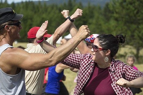 &lt;p&gt;During a women's self-defense lesson Saturday Leah Purdom of Bonners Ferry practices a combo move with instructor Michael Foley at the Patriots Preparedness Rally in Farragut State Park.&lt;/p&gt;
